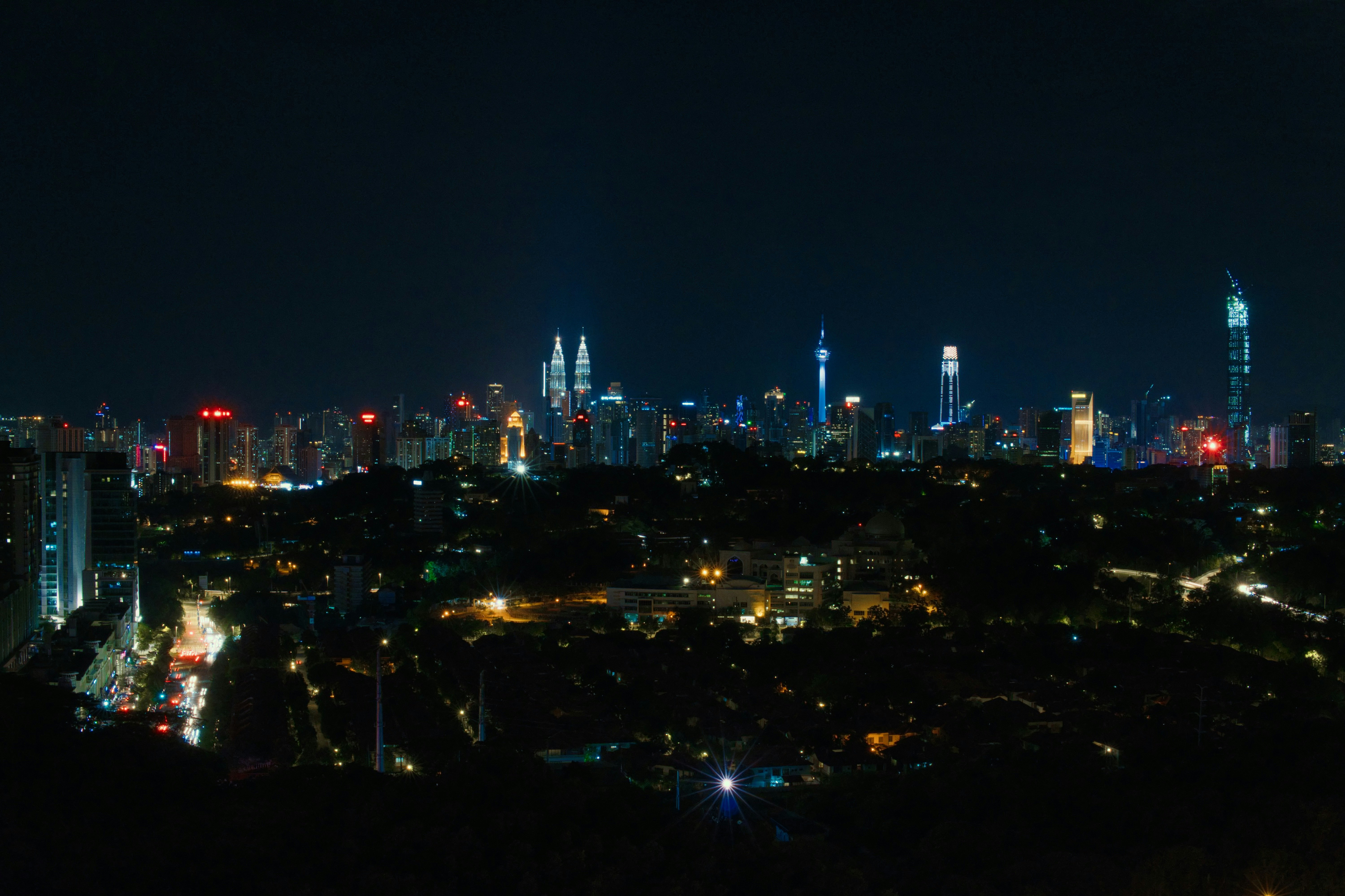 city skyline during night time